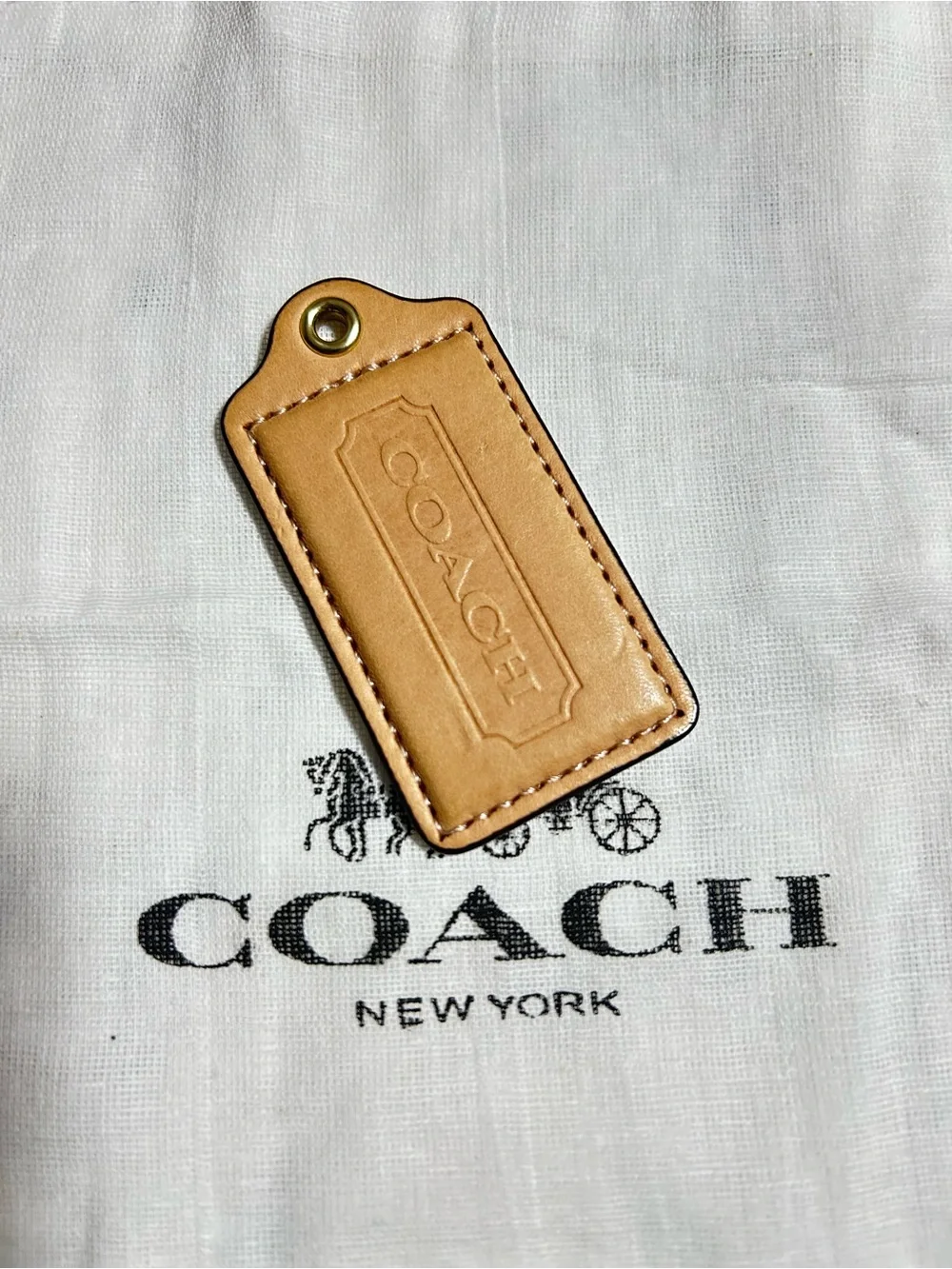 Coach Leather Bag Tags in Cream and Tan